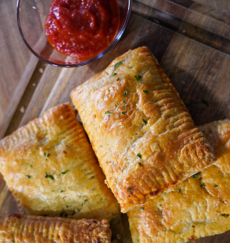 Easy venison pepperoni pizza pockets filled with ground venison, mozzarella cheese, pepperoni and pizza sauce in flaky puff pastry